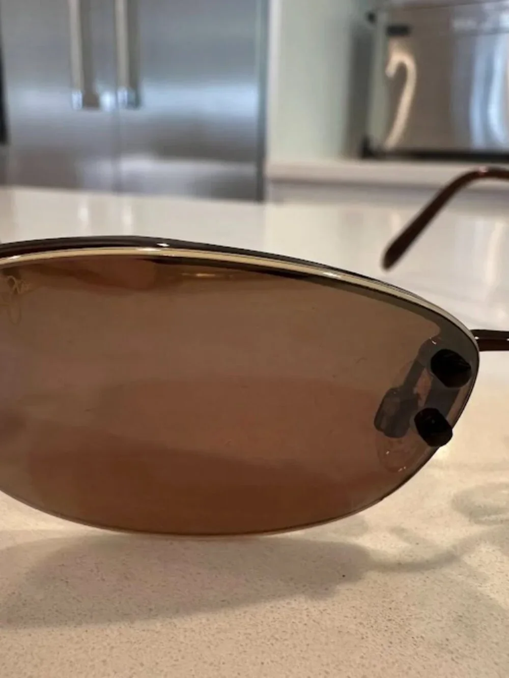 Maui Jim Brown Lens Oval Sunglasses with Gold Nose Pads and Dark Brown Frame